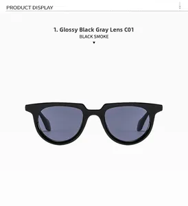 Detail of bright black acetate sunglasses frame with smoke gray lenses in model C01