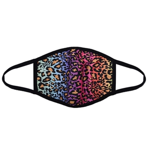 Detail showing the vibrant leopard print fabric and elastic ear loops of this reusable mask