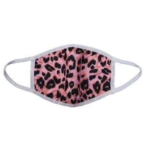 Detail of pink leopard print reusable face mask with elastic ear loops on white background