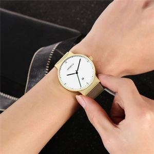 Men's gold quartz watch with mesh strap and white Geneva dial on black background
