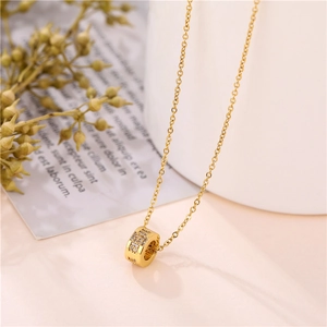 Elegant 18K gold-plated titanium necklace with sparkling crystal cylinder pendant