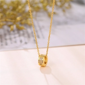 Elegant 18K gold-plated titanium necklace with a sparkling diamond-set cross pendant