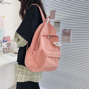Zaino rosa minimalista impermeabile con ciondolo a cucciolo di peluche per studenti
