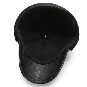 Black faux leather winter baseball hat with thick faux fur lining and ear protection