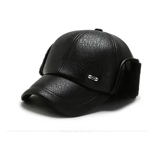 Detail of black winter baseball cap with leather texture, ear flaps and fleece lining