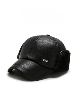 Detail of black winter baseball cap with leather texture and plush ear flaps