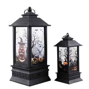 Vintage black Halloween lanterns with glowing pumpkin and ghost patterns on white background