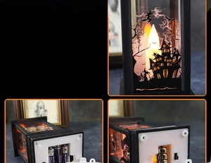 Detail view of Halloween LED lantern showing battery compartment and printed witch motifs