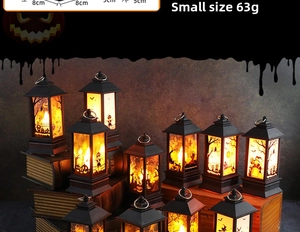 Halloween pumpkin lantern with LED light and spooky tree silhouettes in a vintage setting