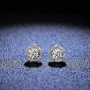 Macro shot of S925 silver halo earrings with brilliant round cut moissanite stones