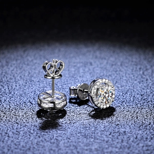 Detailed macro view of S925 silver halo stud earrings with crown shaped hollow backings
