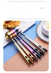 Detail of multi-colored vacuum plated stainless steel coffee scoops with sealing clip