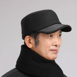 Detail of wool flat top hat and matching scarf for elderly men with leather brim edge