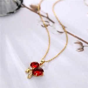 18k gold plated titanium necklace with red agate cherry pendant and diamond leaf