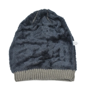 Thick knit winter beanie with warm plush lining and grey ribbed cuff for cold weather