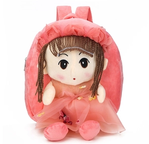 Detail showing plush cartoon doll backpack for kids with pink tutu and floral crown