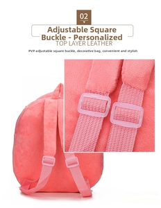 Detail view of adjustable pink plush backpack shoulder straps with transparent buckles