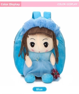 Blue kids canvas backpack featuring a cartoon doll with brown braids and mesh dress