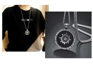 Dettaglio della collana con pendente zodiacale argento con design a sole e simboli incisi