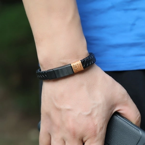Men's retro black braided leather bracelet with magnetic clasp on male wrist