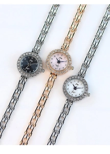 Detailed comparison of crystal-bezel watches in black, pink, and white dials on link bands