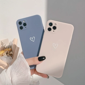 Matte heart pattern iPhone cases in navy blue and cream with full camera protection