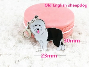 Macro view of an Old English Sheepdog enamel charm with dimensions 30mm by 23mm