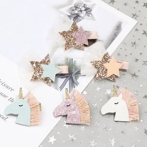 Glitter unicorn and sequin star hair clips set for girls in dreamy pastel colors