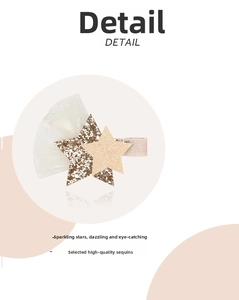 Detail view of pink and gold glitter star hair clip with white tulle and fabric lining