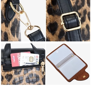 Detail of leopard print handbag with gold hardware and integrated card slots functionality