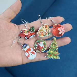 Set of 6 Christmas acrylic earrings including Santa and gingerbread house on palm