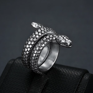 Silver punk snake ring with detailed scale texture and vintage finish in alloy material