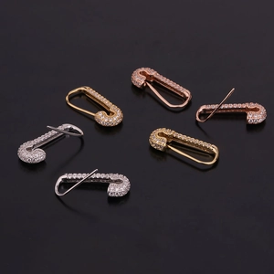 Set di orecchini a spilla da balia in oro, argento e oro rosa con cristalli lucidi