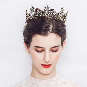 Baroque bridal crown with colorful crystals on a model for weddings and banquets