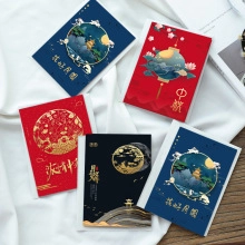 Flat lay of Mid-Autumn Festival greeting cards with red and blue floral patterns