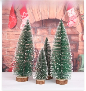 Set of four mini snow-flocked cedar trees with rustic wooden bases for Christmas decor