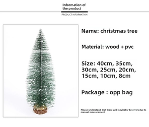 Detail of mini PVC cedar tree with white snow coating and rustic wooden base stand