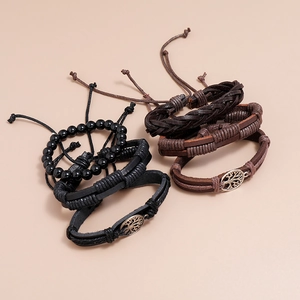 Three-piece retro leather bracelet set with tree of life charm and wooden beads