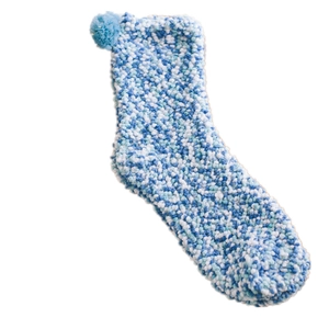 Thick coral fleece mid-calf cake socks with blue pom-pom and speckled texture