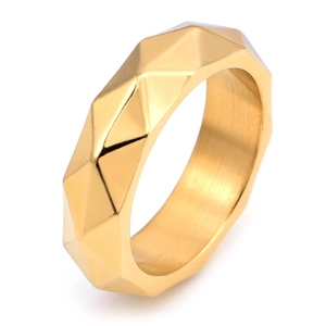 Detailed close-up showing geometric facets of the golden stainless steel ring