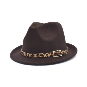 Detail of dark brown wool fedora with leopard print band and golden buckle detail