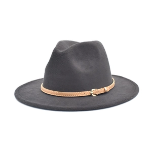 Close-up of charcoal grey wool fedora featuring a tan leather band and gold metal buckle