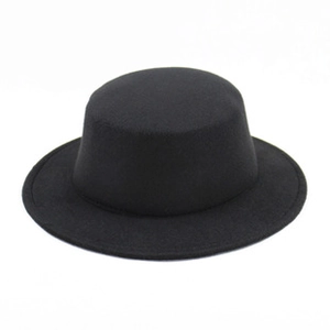 Detailed top view of black wool felt boater hat with flat crown and wide brim