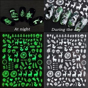Luminous Christmas nail art stickers with reindeer and snowflake patterns for night manicure