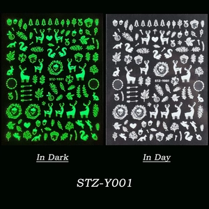 Glow in the dark 3D nail stickers featuring forest deer and snowflake patterns