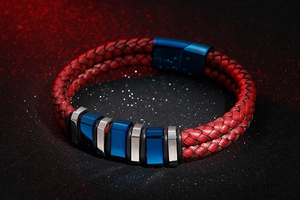 Macro detail of red double-layered braided leather bracelet with blue and silver metal cubes