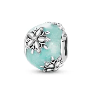 Sparkling S925 sterling silver snowflake charm with ice blue enamel and clear zircon stones