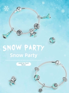 Detailed view of silver snake chain bracelets with Elsa charms and blue enamel snowflakes