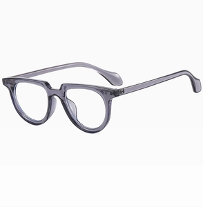 Detail view of transparent grey retro sunglasses with small round frame and keyhole bridge