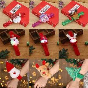 Various Christmas slap bracelets featuring glowing Santa and reindeer designs in a collage